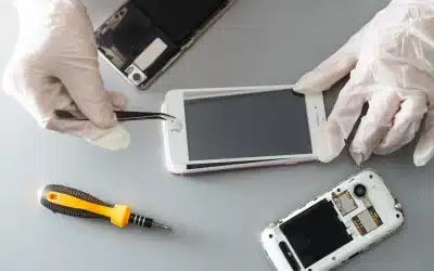 phone repair with tools and protective gloves